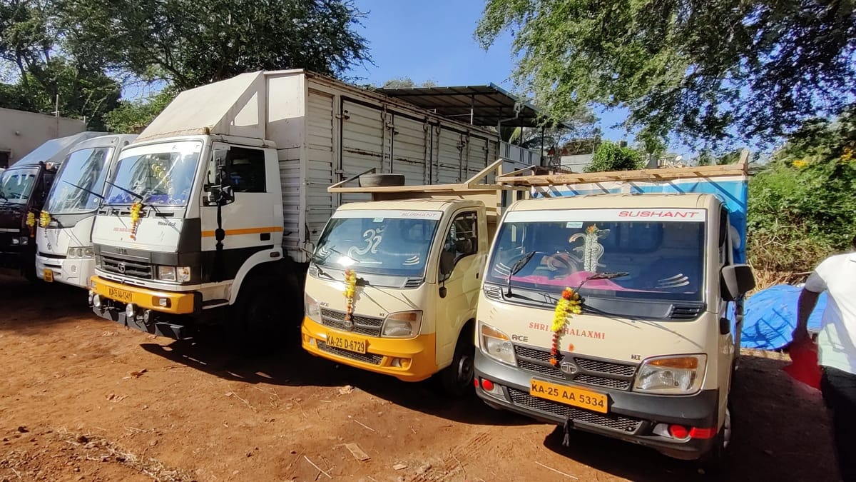 Sushant fleet lineup of Tata trucks and Ace mini trucks in the Dharwad yard