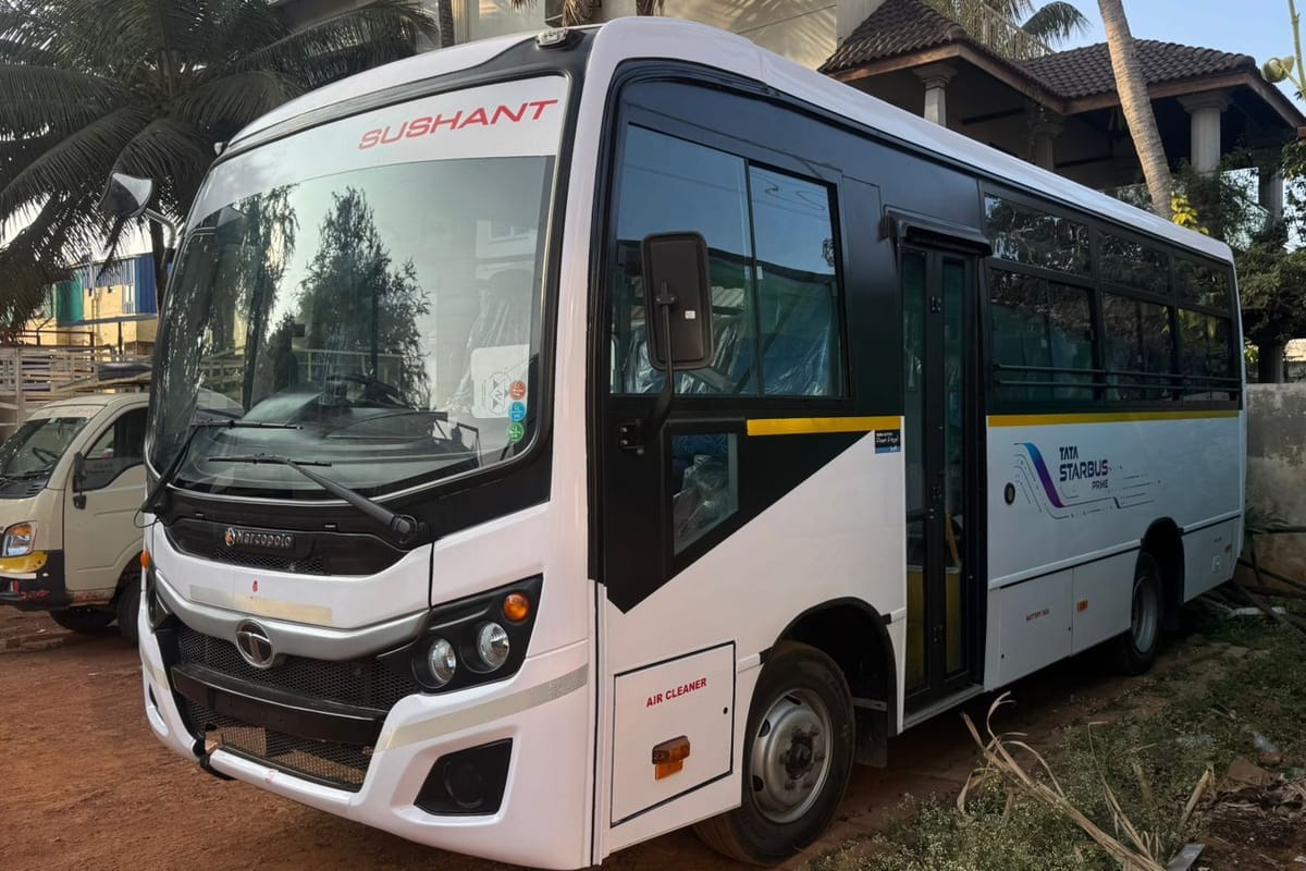 White Tata Starbus Prime coach with SUSHANT lettering above the windscreen