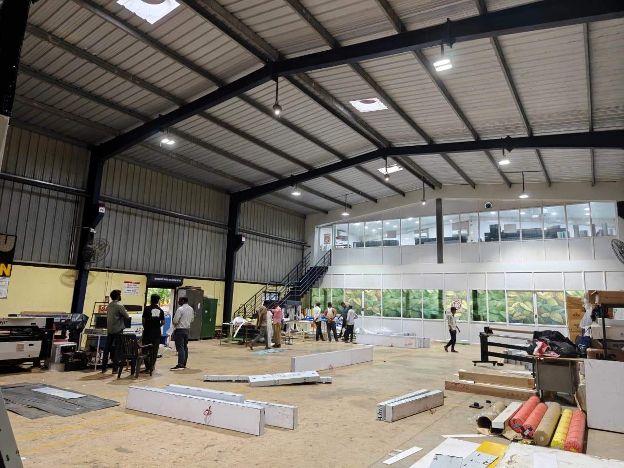 The crew at work in the Belur fabrication hall
