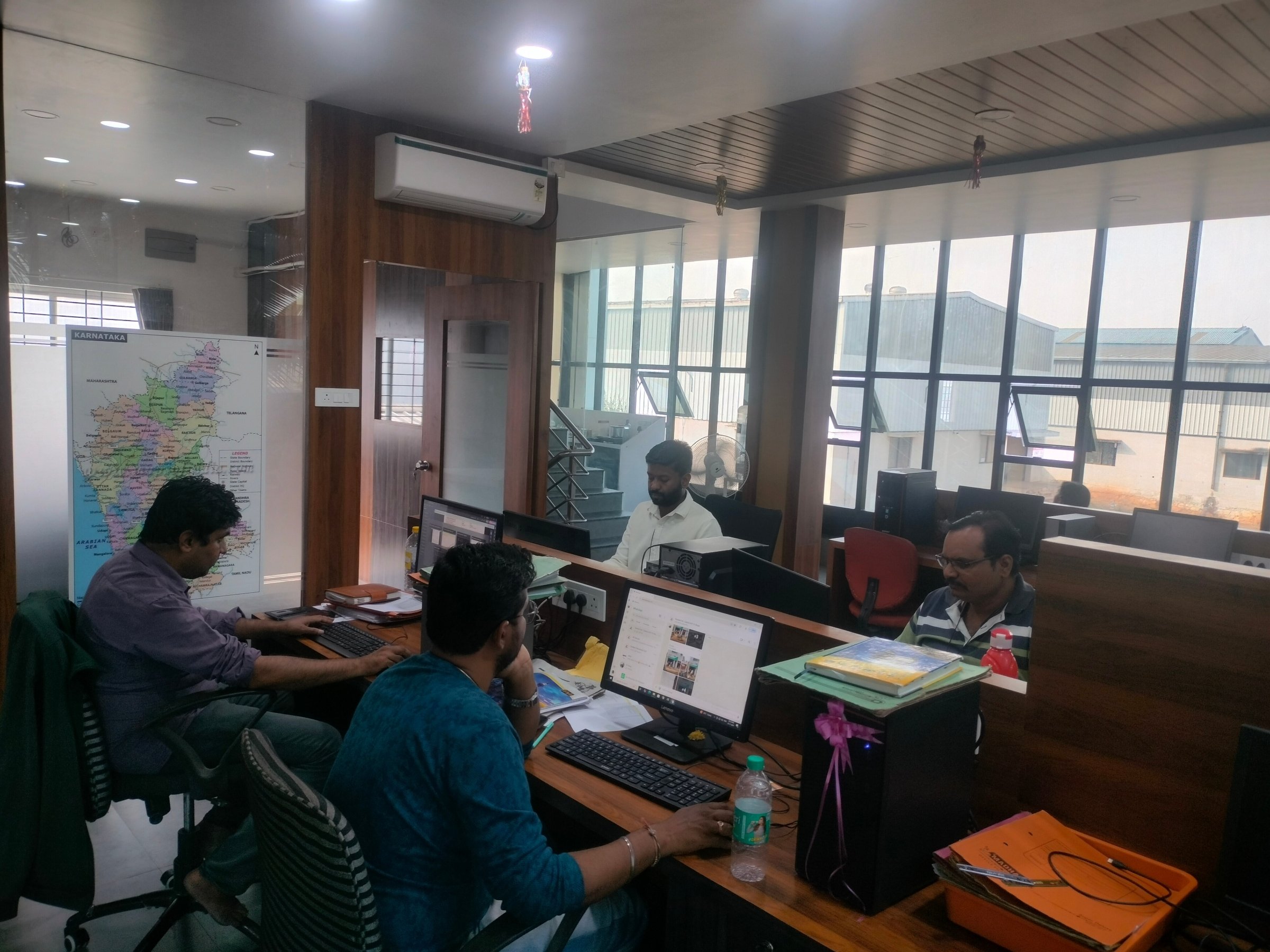 Design and prepress team at work in the Dharwad office